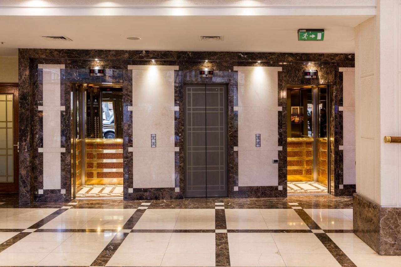 Plaza El Bosque Ebro Hotel Santiago Exterior foto Elevators at the hotel